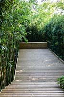 Jardin Zen. Decking and bamboo. Les Jardins D'etretat, Normandy, France. 