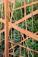 Taxus baccata - Yew - hedging behind corten steel screen, 'A Garden for all Seasons', Ascot Spring Garden Show, 2018.