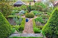 View of formal vegetable and herb garden with box knot, Marina WÃ¼st garden, Germany. 