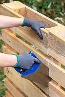 Sawing a pallet in half