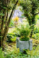 Decorative planter in fernery. Fanore, Ireland