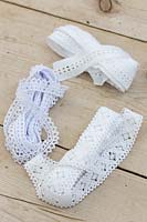 Bundles of lace ribbon