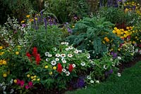 Vegetables to add interest to a summer flower border.  
