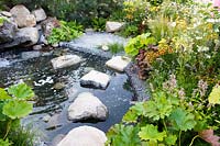 Stepping stones over pond. Great Gardens of the USA: The Oregon Garden, RHS Hampton Court Palace, 2018