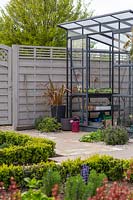 Greenhouse in suburban garden 