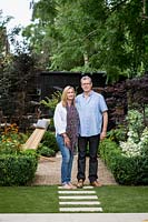 Claire and Sean McHugh in garden designed by Nick Gough