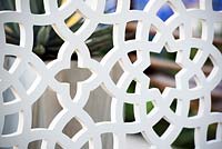 Detail of ornamental white screen - A Very Modern Problem, RHS Hampton Court Palace Flower Show 2018