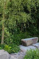 The Wedgwood Garden - Stone path and bench with Salix alba 'Tristis'- Sponsor: Wedgwood - RHS Chelsea Flower Show 2018