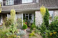 View of front garden with prairie style planting. Somerset, UK.