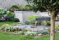 Water spout and rill with low planting in gravel - 'The Yardley Flower' Garden, Ascot Spring Garden Show, 2018.