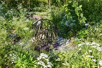 'Tumbleweed' bronze sculpture by Jill Berelowitz - The Health and Wellbeing Garden, Sponsored by CED Ltd, Majestic Trees, Marshal Murray, RHS Hampton Court Flower Show, 2018.