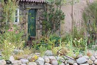 Entrance to stone shed, 'Rias de Galicia: A Garden at the End of the Earth', RHS Hampton Flower Show, 2018