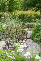 'Tumbleweed' sculpture by Jill Berelowitz, The Health and Wellbeing Garden, Sponsored by CED Ltd, Majestic Trees, Marshal Murray, RHS Hampton Court Flower Show, 2018. 