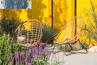 Wooden chairs in show garden - Santa Rita 'Living La Vida 120' Garden, Sponsored by Santa Rita Wines, RHS Hampton Court Palace Flower Show, 2018. 