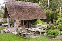 Thatched well house. Caervallack Farm, St Martin, Helston, Cornwall, UK