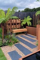 Steel wood store - Bee's Gardens: The Penumbra, Sponsored by CED Stone Group, Oxford Oak, The Pot Company, RHS Tatton Park Flower Show, 2018. 

