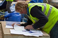 Surveyor consulting plans in preparation for RHS Chelsea Flower Show