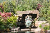 Contemporary sculpture by Simon Gudgeon, in Pool Garden designed by Peter Dowle.
