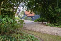 Driveway to barn - Thundridge Hill House Garden, Hertfordshire, UK