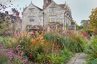 Autumnal planting in the gardens of Gravetye Manor, Sussex, UK.

