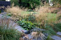 Mixed border in contemporary country garden near Winchester, Hants, UK. Designed Elks-Smith Garden Design.