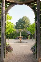 Formal fountain in Collector Earl's Garden. Arundel Castle, Sussex, UK. 