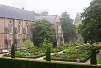 The East Garden laid out with euonymus and yew hedging at the Bishop's Palace Garden, Wells, Somerset, UK