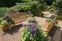 Seating area at Old Vicarage Gardens, Norfolk, UK.
