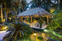 The chickee hut and pond at The Jones Residence, Key West, Florida, USA. Garden design by Craig Reynolds.
