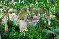 Classic statue in The shade garden, in garden of designer Karen Tatlow, Lichfield.
