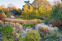 Aerial view of terraced garden with autumn colour at Barn House, Chepstow, UK. 