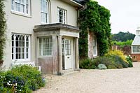 Front door and gravel driveway at Bosvigo House, Cornwall, UK.