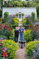 Steve and Phillippa Lambert, in the walled garden they rescued from dereliction, and restored as an early Victorian kitchen garden. 