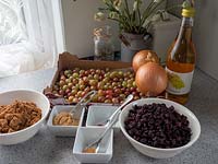 Gooseberry harvest and other ingredients set up to make chutney. 