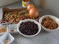 Gooseberry harvest and other ingredients set up to make chutney.
