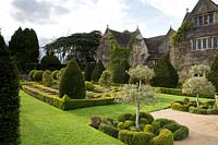 The Knot Garden and house at at Abbey House Gardens, Malmesbury, UK. 