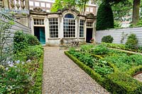 The garden at Huis van Brienen, restored by Saskia Albrecht and funded by the Canal Garden Fund, which uses the money from the open garden days to resource restoration of the canal house gardens. Amsterdam, The Netherlands. 
