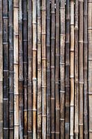 Bamboo screen. The Equilibrium Garden, designed by Richard Heys MICHort and Audra Bickerdyke, working with female prisoners at HMPPS and YOI Styal, RHS Tatton Park Flower Show, 2019.