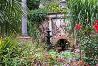 A fantastical folly and fountain in the heart of Great Comp garden.
