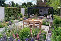 Timber and Steel open garden room with Green living roof. Contemporary outdoor garden. RHS Hampton Court Festival 2019.