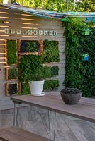 Living wall with salad and herbs - Year of Green Action Garden, RHS Hampton Court Palace Flower Festival 2019