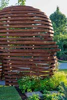 Corten steel face sculpture by William Roobrouck - Through your Eyes, RHS Hampton Court Palace Flower Festival 2019