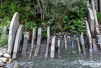 Rocks representing coastal rock formations with wave machine - Facebook: Beyond the Screen, RHS Chelsea Flower Show 2019.