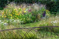 Summer borders in Jordan's wildlife garden - RHS Hampton Court Flower Show 2014.