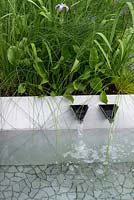 Modern geometric water spouts in The Waterscape Garden at RHS Chelsea Flower Show 2014 - Sponsor: RBC