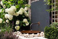 Water feature with copper pipe and bowl 