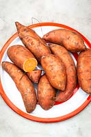 Harvested Ipomoea batatas - Sweet Potato - on a plate