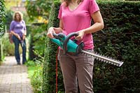 Alternative hedge trimming equipment options - electric hedge trimmer and hand shears