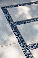 Paving stones and pebbles.