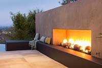 Modern fireplace feature in garden, San Diego, USA
